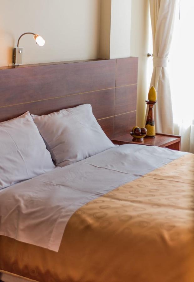 Hotel Flor De Los Andes Tulcan Bagian luar foto